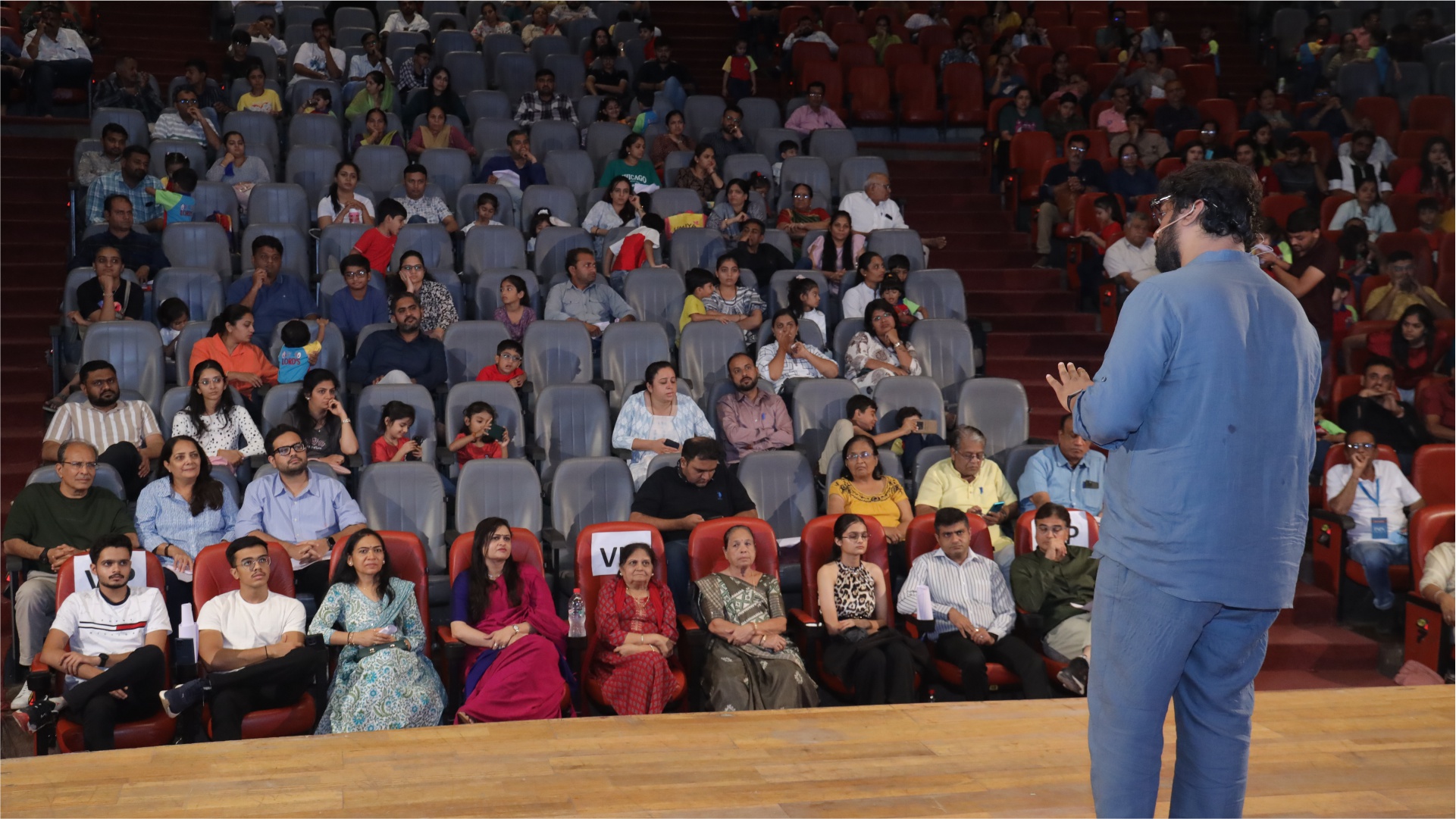Women walking between trees